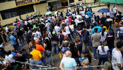 Tense Venezuela votes in shadow of ‘bloodbath’ warning