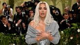 Fans are divided over Kim Kardashian’s Met Gala sweater. She explains why she wore it