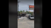 ‘Like a bomb.’ Train slams into tractor-trailer near busy gas station, SC video shows