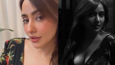 Sexy! Neha Sharma Flaunts Ample Cleavage In A Black Floral Dress; Hot Photos Go Viral - News18