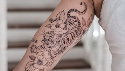 Tatuagem de tigre feminina: 20 ideias criativas para se jogar em diferentes estilos de arte