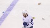 New Jersey Devils fans litter ice after three disallowed goals vs. Toronto Maple Leafs