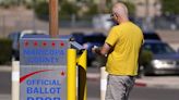 Judge restricts far-right group from carrying weapons, taking video at Arizona ballot drop boxes