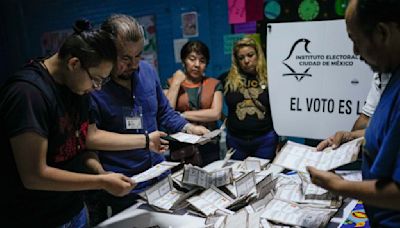 Mexico awaits results in an election likely to choose the country’s first female president