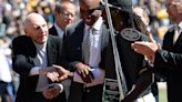 In this file photo, former Pittsburgh Pirates Dick Groat left, and Barry Bonds, center, shake hands with Andrew McCutchen. The Pittsburgh Pirates defeated the...