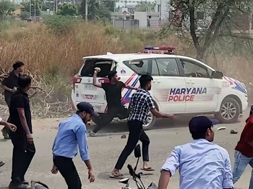 WATCH: Violent Protests In Haryana's Gurugram After Factor Bus Mows Down Employee ; Officer Among 2 Cops Injured