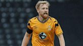 Cambridge midfielder Brophy signs new deal