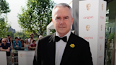 Former BBC presenter Huw Edwards charged with making indecent images of children