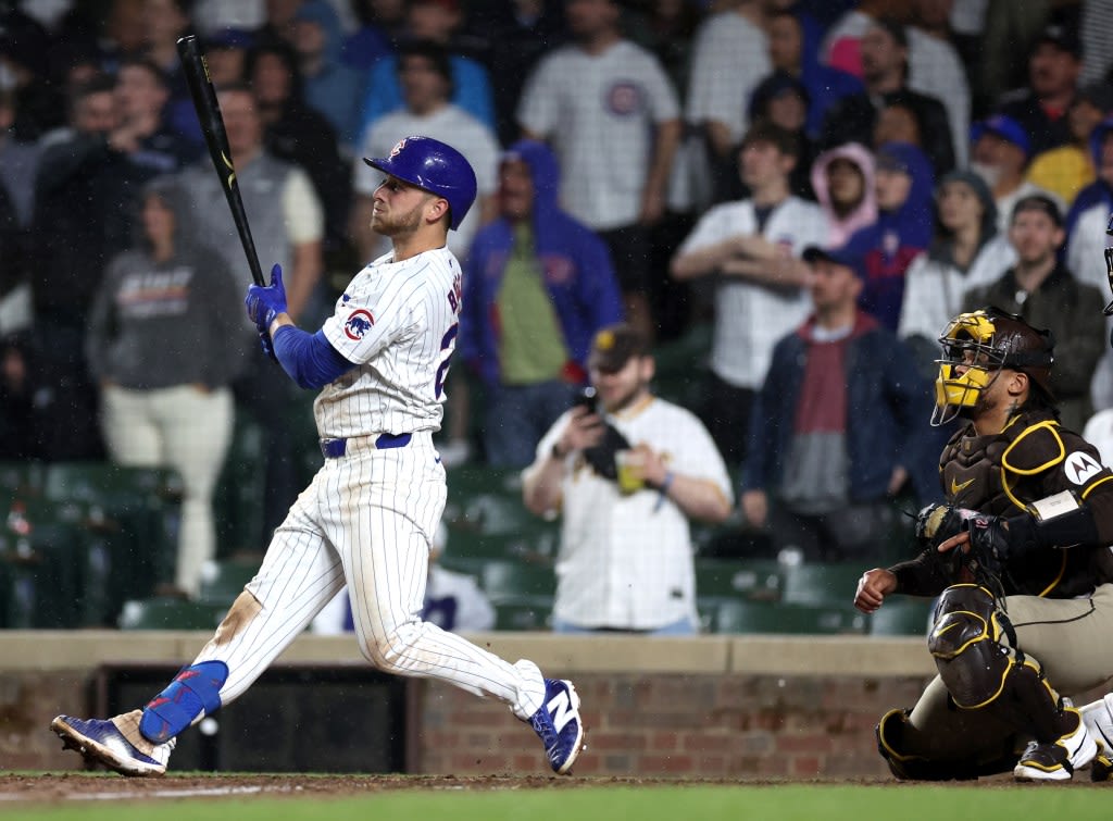 Michael Busch’s first walk-off home run sets off Chicago Cubs’ rainy victory celebration over San Diego Padres