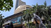 Indian stocks hit record highs as exit polls suggest big Modi win