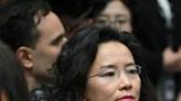 Australian journalist Cheng Lei observes a signing ceremony by China's Premier Li Qiang and Australia's Prime Minister Anthony Albanese at the Australian Parliament...