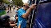 Evacuations increase tenfold in Ukraine’s east as Russia inches forward with bombs and infantry
