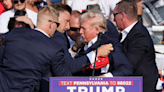 Trump rushed off stage at rally as bangs heard