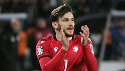 Kvaratskhelia leads divided Georgia to Euros debut