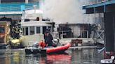 Boat fire spreads to building in Westlake