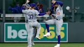 Dodgers rally with 7-run 9th in wild win at Coors