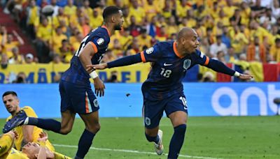 Malen doubles up as Dutch beat Romania to reach Euro 2024 quarters