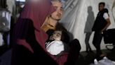 Hamas accepts Gaza cease-fire; Israel says it will continue talks but is conducting strikes in Rafah