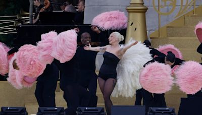 Flotilla on Seine, rain and Celine Dion mark start of Paris Olympics