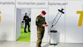 Germany scraps a COVID-19 vaccination requirement for military servicepeople