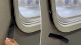 Flight attendant tells passenger that she’s ‘overreacting’ to taped airplane window