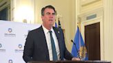 Gov. Stitt praises Hispanic community, says he's 'still reviewing' new immigration bill.