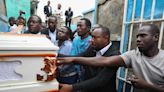 Hundreds mourn gang killings of a Haitian mission director and a young American couple