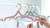 Overpacker? Bring these genius foldable hangers — they're just over $1 a pop right now