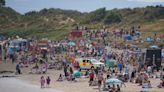 Temperatures climb to high 30s as heatwave puts pressure on services