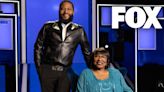 Anthony Anderson & Mom Doris Bowman Replacing Jamie & Corinne Foxx As Hosts Of Fox Game Show ‘We Are Family’