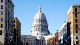 Neo-Nazis parading swastikas, chant 'there will be blood,' and gather outside a synagogue in Wisconsin, say reports