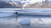 Dodging Icebergs, Surfing Tsunami Glacier Waves (Watch)