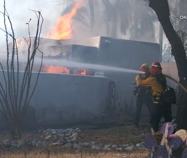 Riverside wildfire guts homes; officials say suspects who lit fireworks were seen on camera