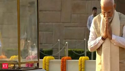 PM Modi, Om Birla pay floral tributes to Mahatma Gandhi on his 155th birth anniversary at Rajghat