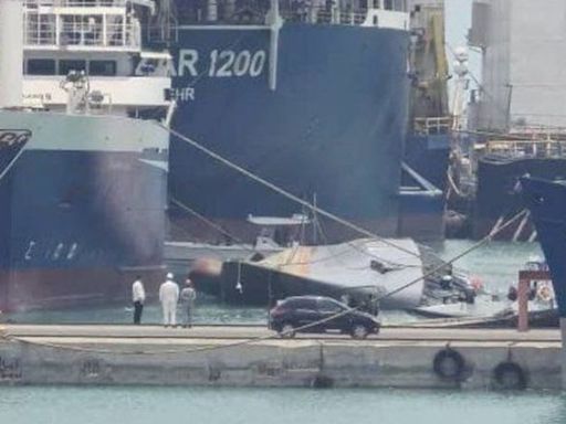 Iranian warship rolls over in port, could be out of action six months