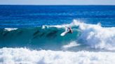 'Magical' moment as surfer shares wave with pod of dolphins as she wins first world championship tour event