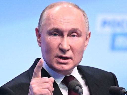 Putin's brutal Kremlin purge as Russian general dragged from bed and arrested
