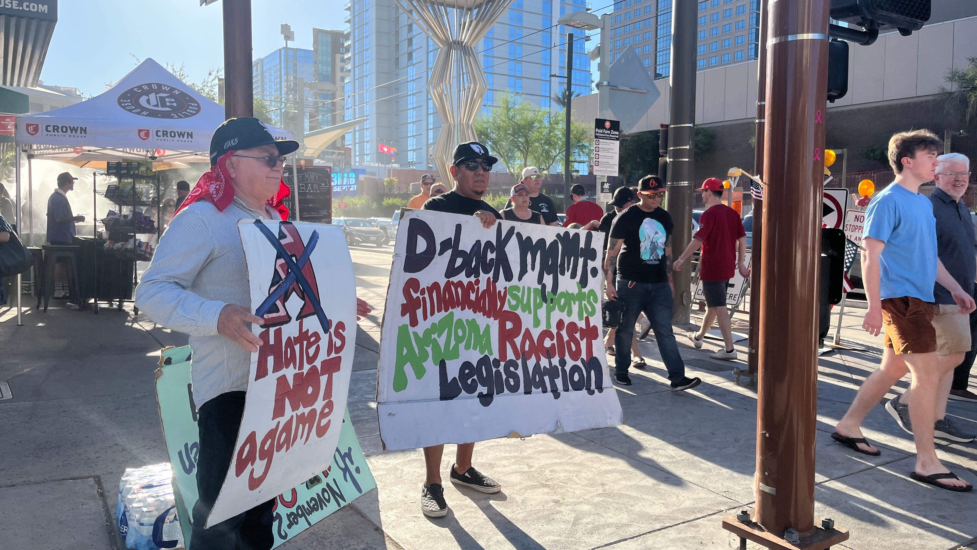 Protesters say Arizona Diamondbacks owner supports tougher immigration law