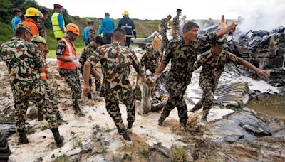 Plane crashes just after takeoff from Nepal's capital, killing 18 people. Pilot is lone survivor