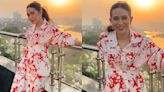 Karisma Kapoor’s red and white printed maxi dress is the best choice for chill brunch date
