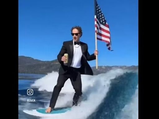 Mark Zuckerberg stuns netizens as he wishes ‘Happy Birthday America’ while surfing in tux with US flag in hand
