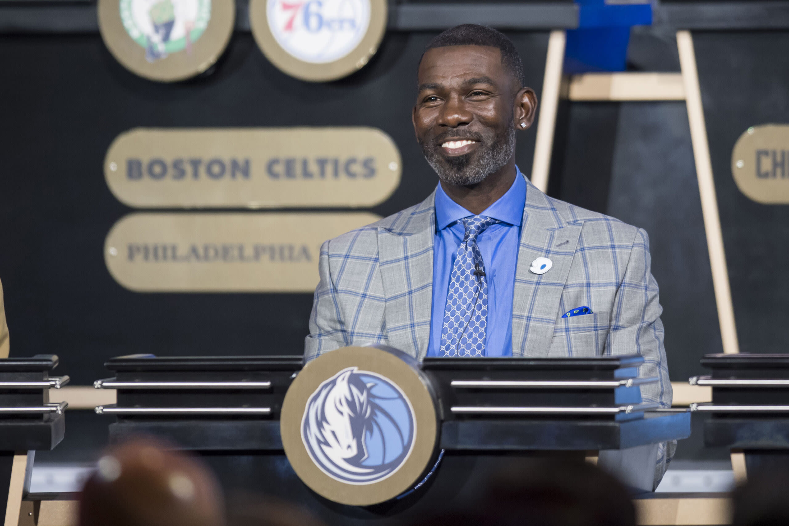 WATCH: Wisconsin legend Michael Finley steals beer from Luka Doncic in viral moment