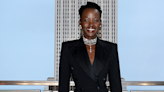 Lupita Nyong’o looks straight out of Cabaret in blazer leotard and fishnets