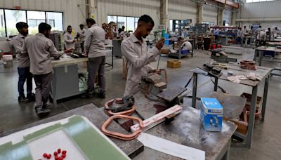 India's Modi plans post-election reforms to rival Chinese manufacturing