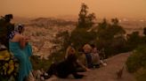 Martian skies over Athens? Greece's capital turns an orange hue with dust clouds from North Africa