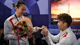 Olympian gets engaged in front of world's media after medal ceremony in sweet City Of Love proposal