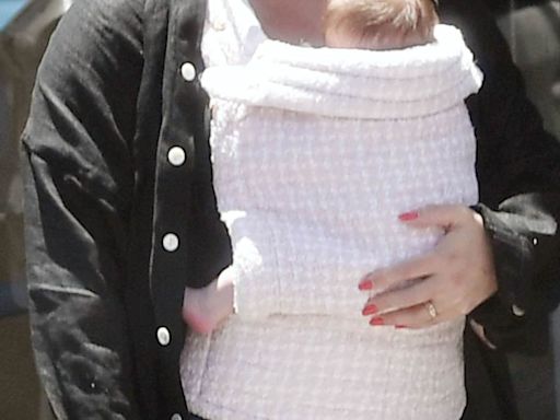 Hilary Duff is radiant as she steps out with newborn daughter Townes