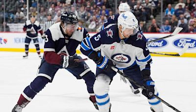 Jets' Brenden Dillon day-to-day after receiving stitches on hand for apparent cut from skate blade