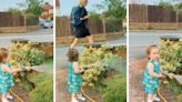 Toddler watering the garden accidentally sprays random stranger walking by: ‘Perfect timing’