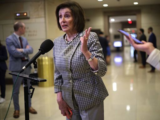 Pelosi offered a vague answer when pressed about Biden continuing his campaign: 'I want him to do whatever he decides to do'